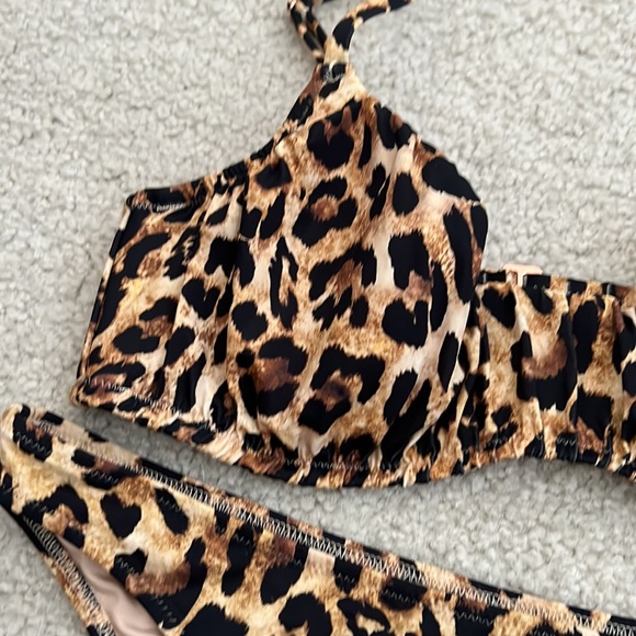 Brand new. Beautiful animal print bikini top and bottom. Never worn! - Picture 2 of 4